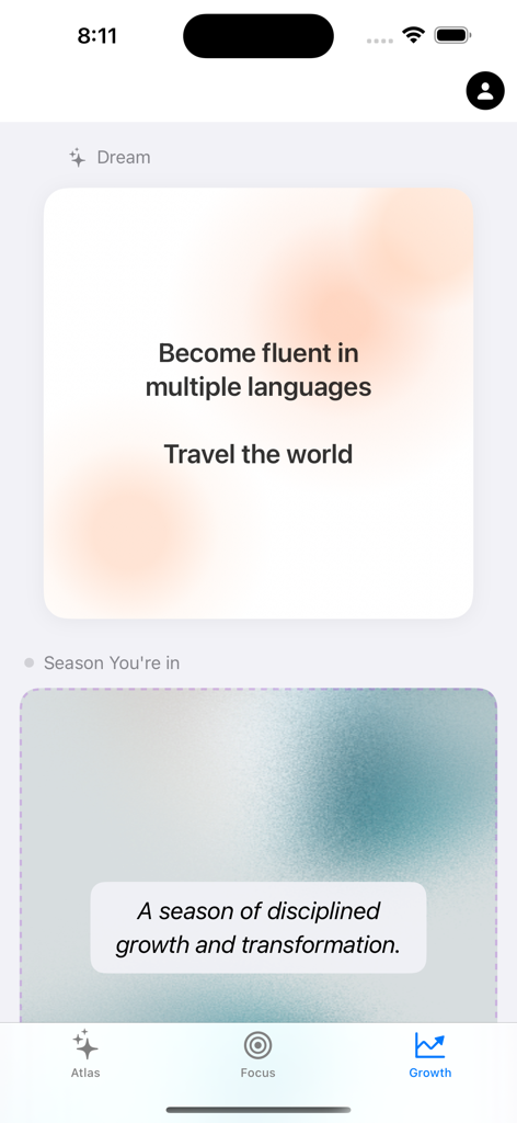 Atlas AI Coach - Pantalla de crecimiento de la aplicación Atlas AI Coach que muestra una tarjeta de visión con sueños como dominar varios idiomas y viajar por el mundo