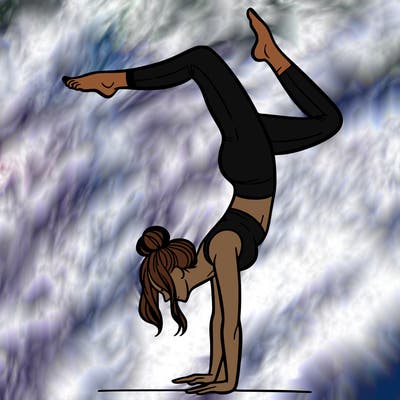 a woman doing a handstand