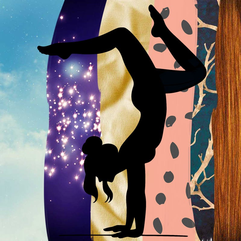 a woman doing a handstand