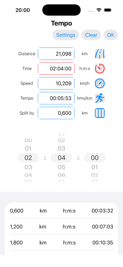 Tempomat - Tempomatアプリのインターフェース。ハーフマラソン距離のランニングペースとスプリットタイムの計算が表示されています。