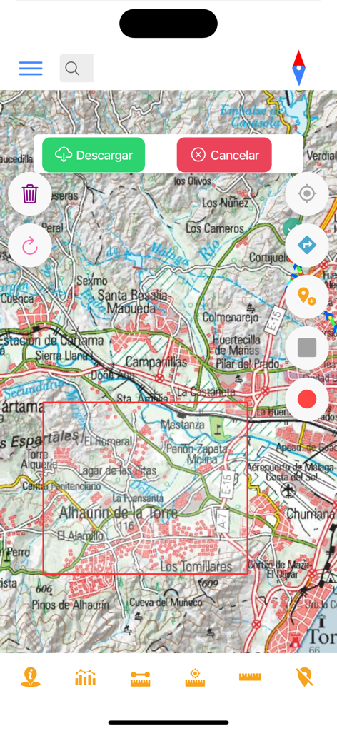 オフラインダウンロード用に選択された地形図エリアを示すMapas de España Básicosアプリのインターフェース。
