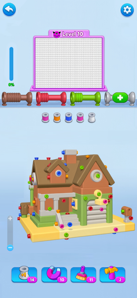 Gameplay di Wool Escape 3D con una casa 3D coperta da gomitoli colorati.