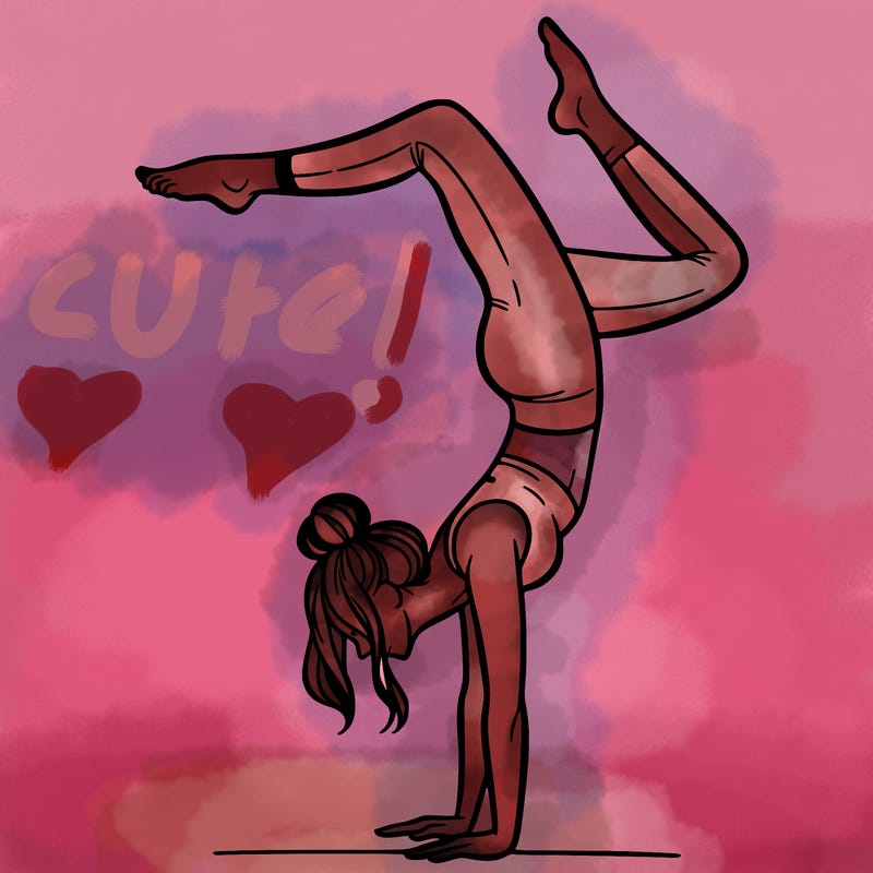 a woman doing a handstand