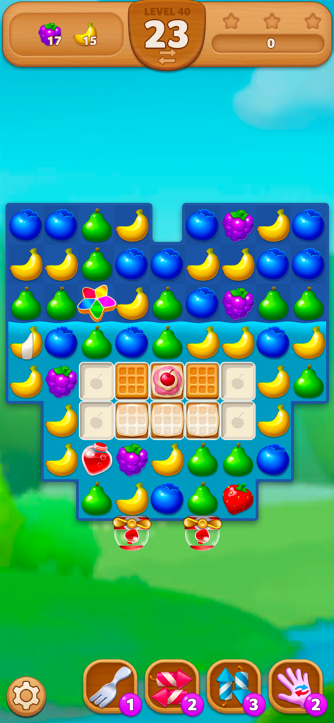 Fruits Mania:Belle's Adventure - Jugabilidad de Fruits Mania La Aventura de Belle mostrando un nivel de puzzle match-3 con frutas coloridas