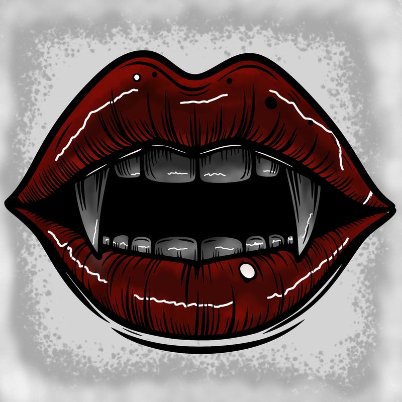 lips with vampire teeth