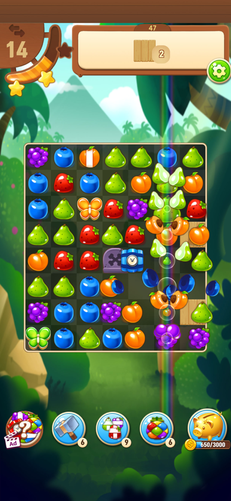 Fruits Master : Match 3 Puzzle - Gameplay of Fruits Master showing colorful fruit matches and a butterfly effect on a jungle background