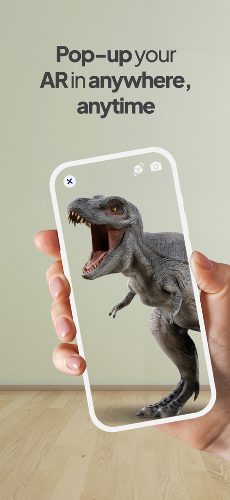 Assemblr Studio: Easy AR Maker - Una mano sosteniendo un smartphone mostrando un dinosaurio T-Rex en 3D en un entorno de realidad aumentada