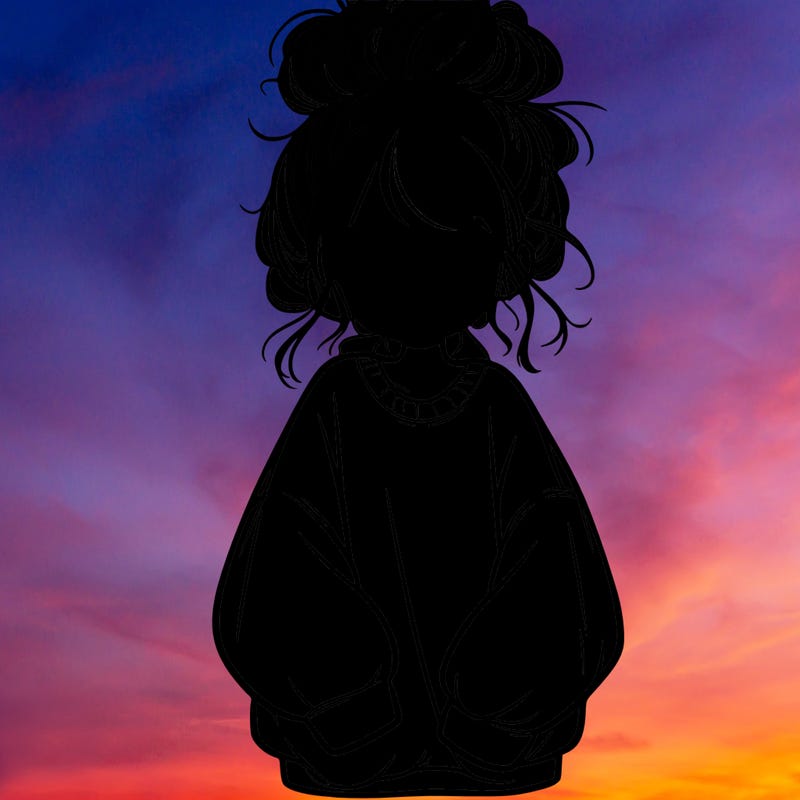 girl with baggy sweatshirt and messy bun