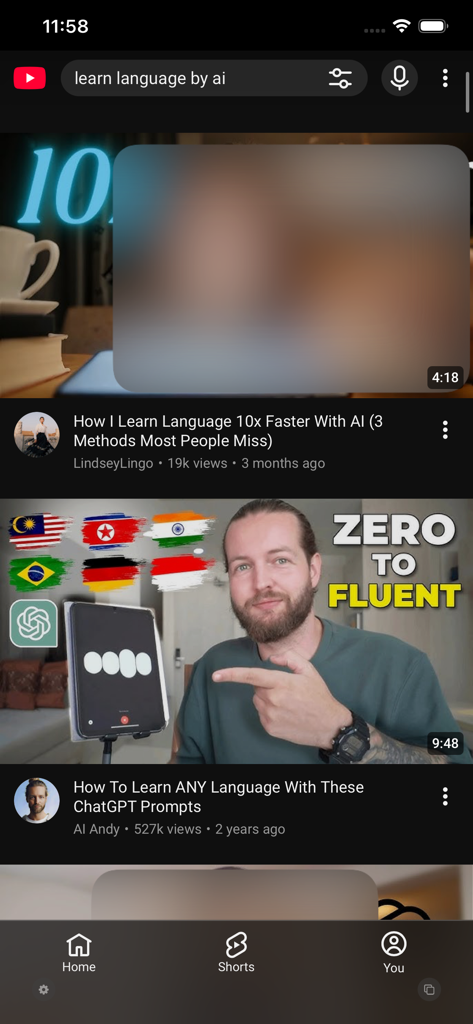 Vista móvil de YouTube con una miniatura de video difuminada para una navegación modesta