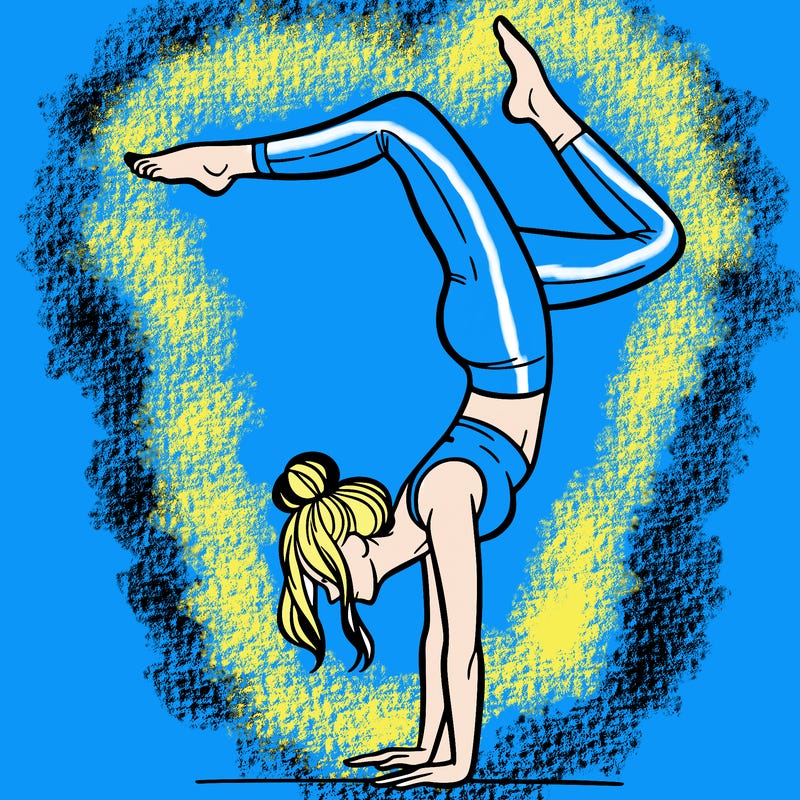 a woman doing a handstand