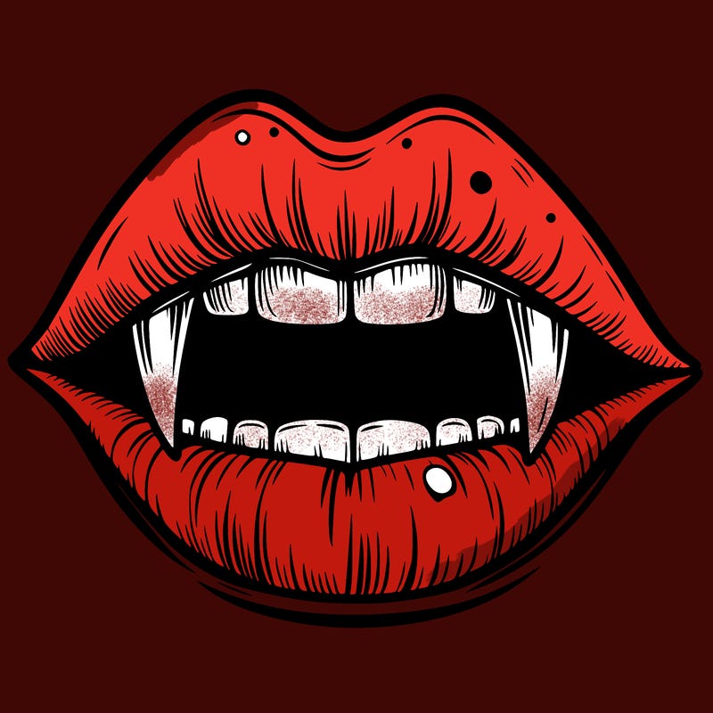 lips with vampire teeth