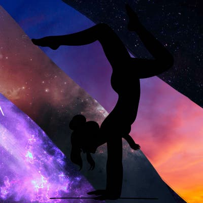 a woman doing a handstand