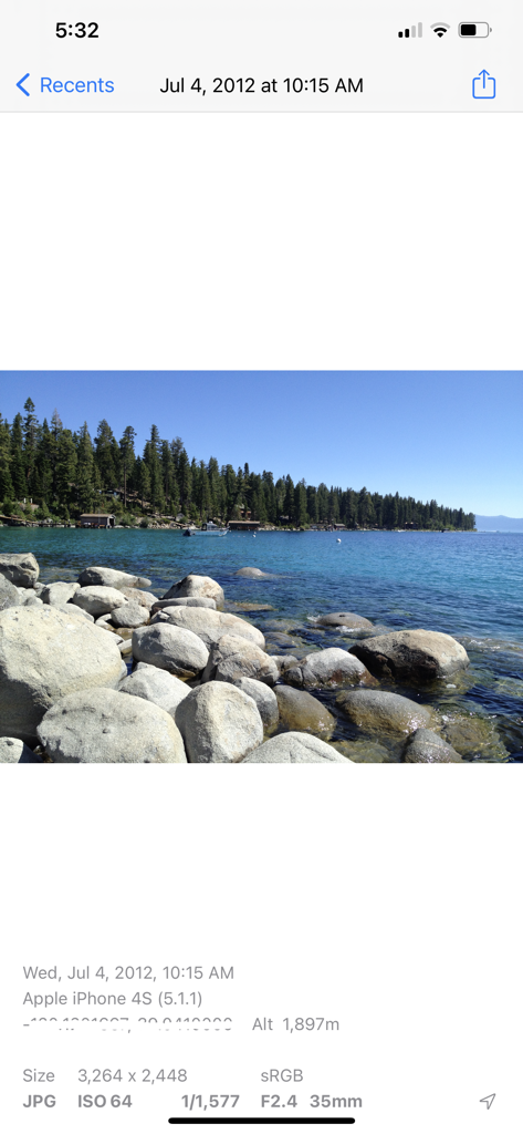 Photo Albums and Widget - Detailed EXIF metadata and camera settings for a landscape photo in the app