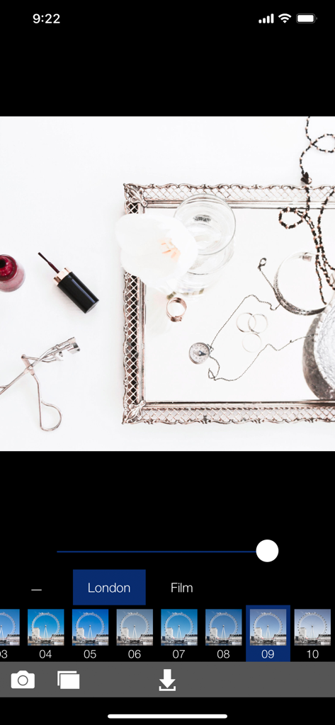 Aesthetic flat lay photo of jewelry and accessories edited with Analog London film filter.