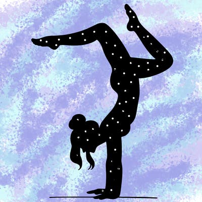 a woman doing a handstand