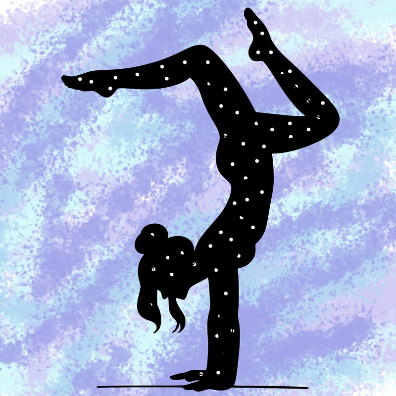 a woman doing a handstand