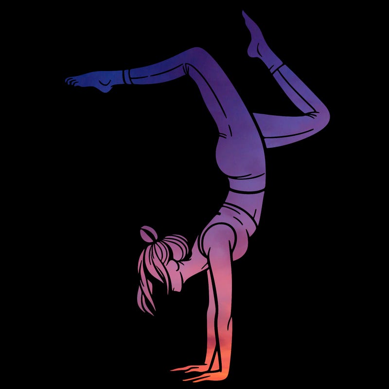 a woman doing a handstand