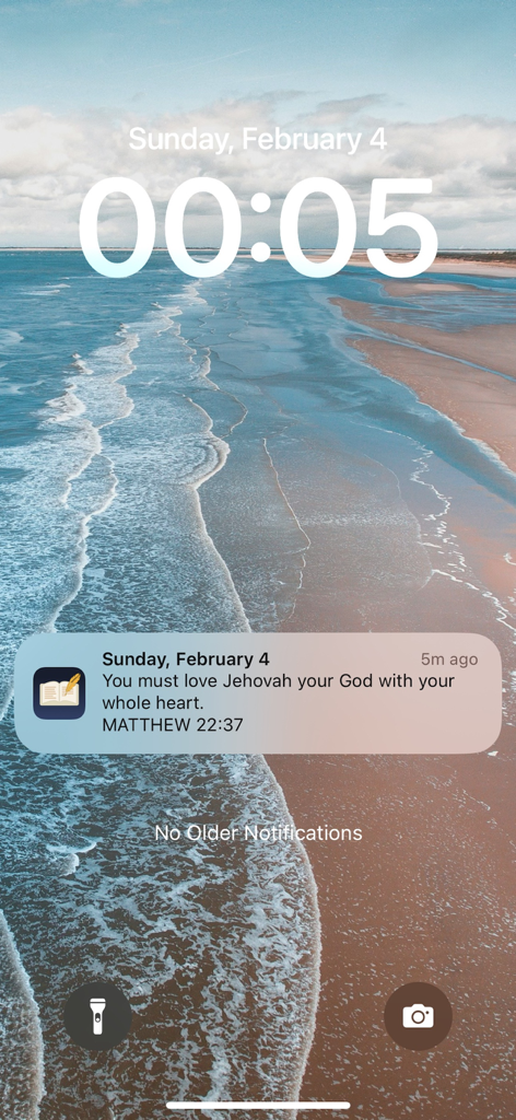 Daily Text with Jehovah - A daily scripture notification from the Daily Text with Jehovah app displayed on an iPhone lock screen with a beach background.