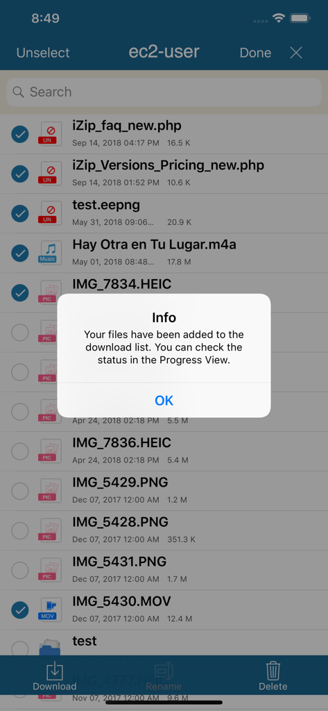 La aplicación iTransfer mostrando una pantalla de selección de archivos y una notificación emergente confirmando que los archivos se han agregado a la lista de descargas desde un servidor