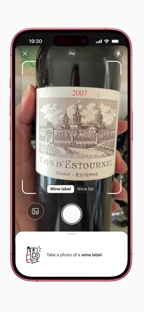 A smartphone screen showing the Vivino app camera scanning a wine label for ratings and reviews