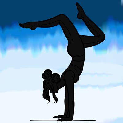a woman doing a handstand