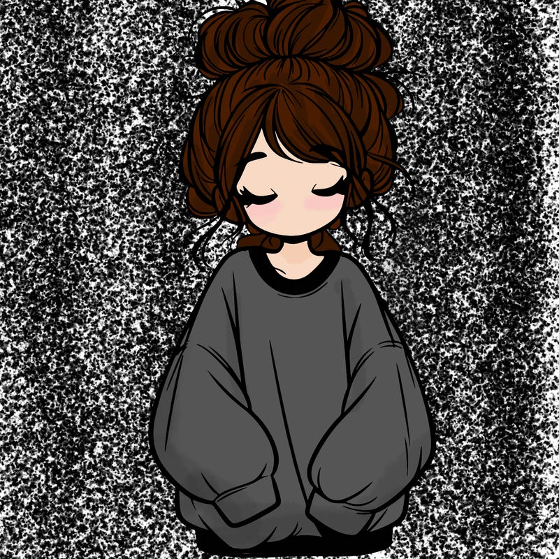 girl with baggy sweatshirt and messy bun