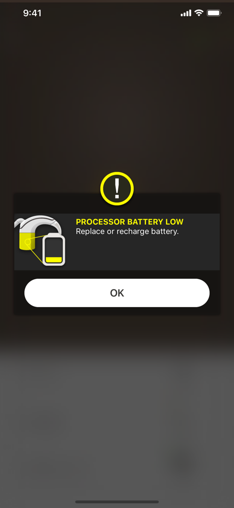 Notification d'alerte de batterie faible sur l'application Nucleus Smart pour un processeur cochléaire.