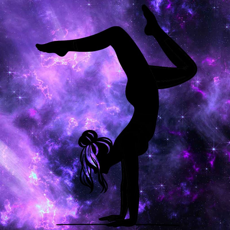 a woman doing a handstand