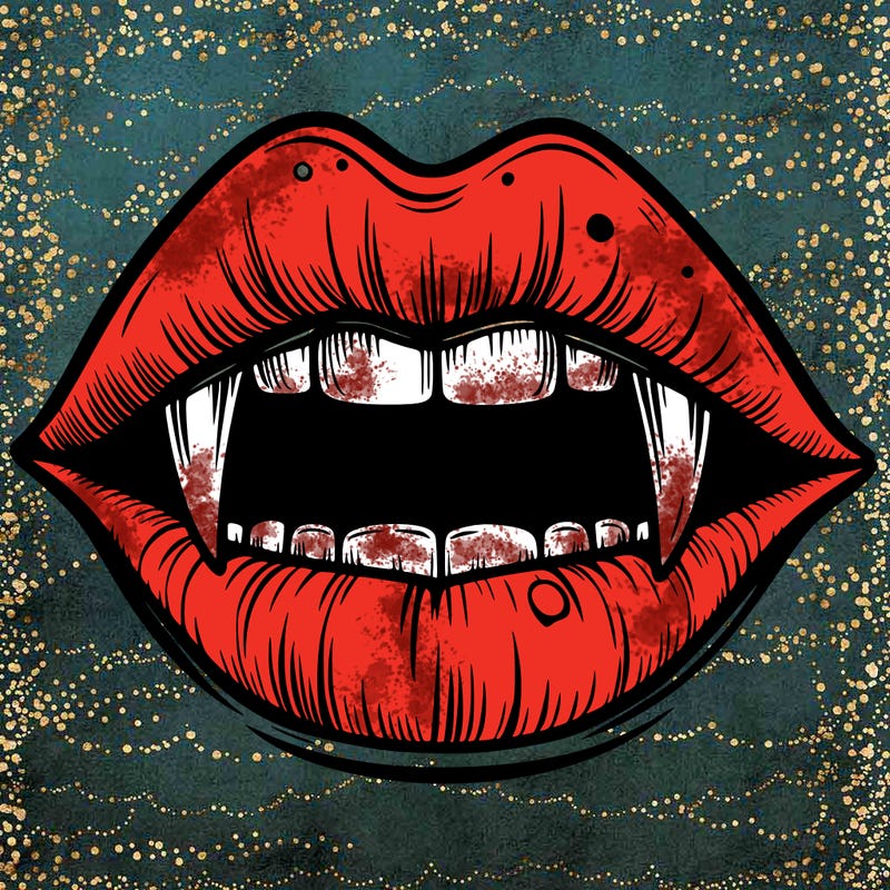 lips with vampire teeth
