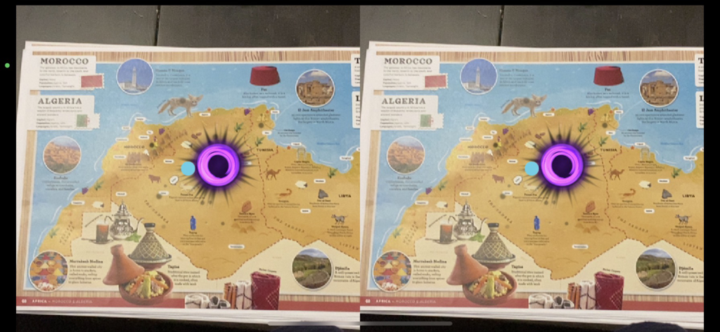 Stereoscopic VR view of a world atlas map showing Morocco and Algeria with a digital interaction portal.