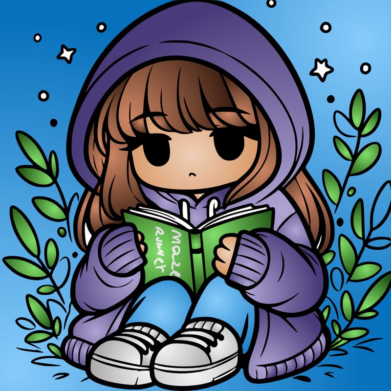 girl in oversized hoodie reading a book