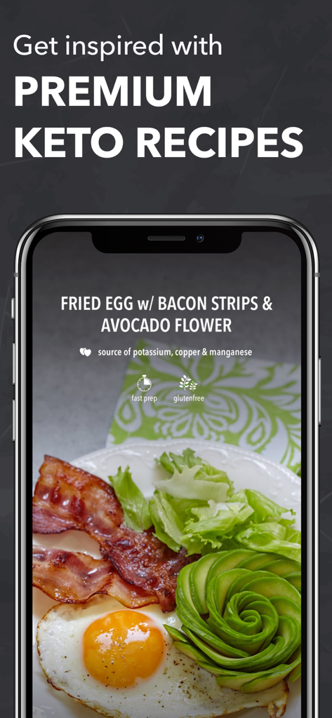 A smartphone displaying a keto recipe for fried eggs with bacon and an avocado flower