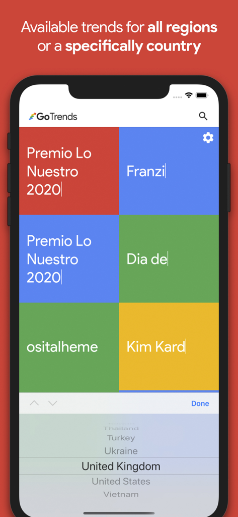 GoTrends for Google Trends - Screenshot of GoTrends app showing trending topics in a grid and a country selector menu