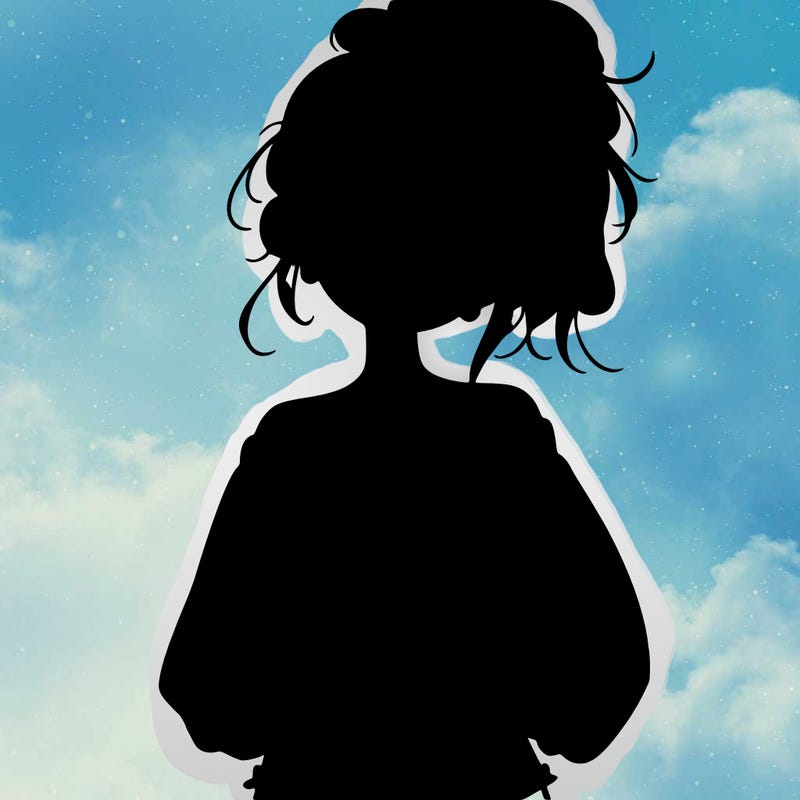 girl with a messy ponytail glasses a baggy crop top and jean shorts