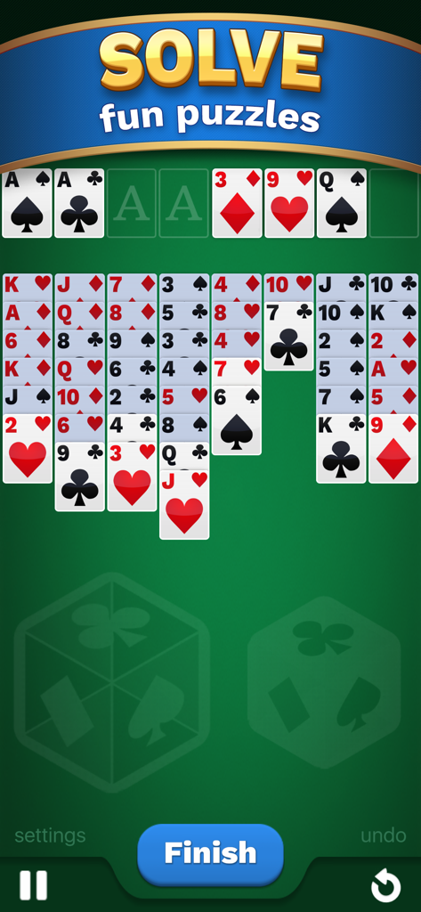A gameplay screenshot of Freecell Solitaire Cube showing a classic card layout on a green background with a banner reading Solve fun puzzles.