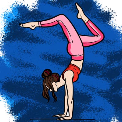 a woman doing a handstand