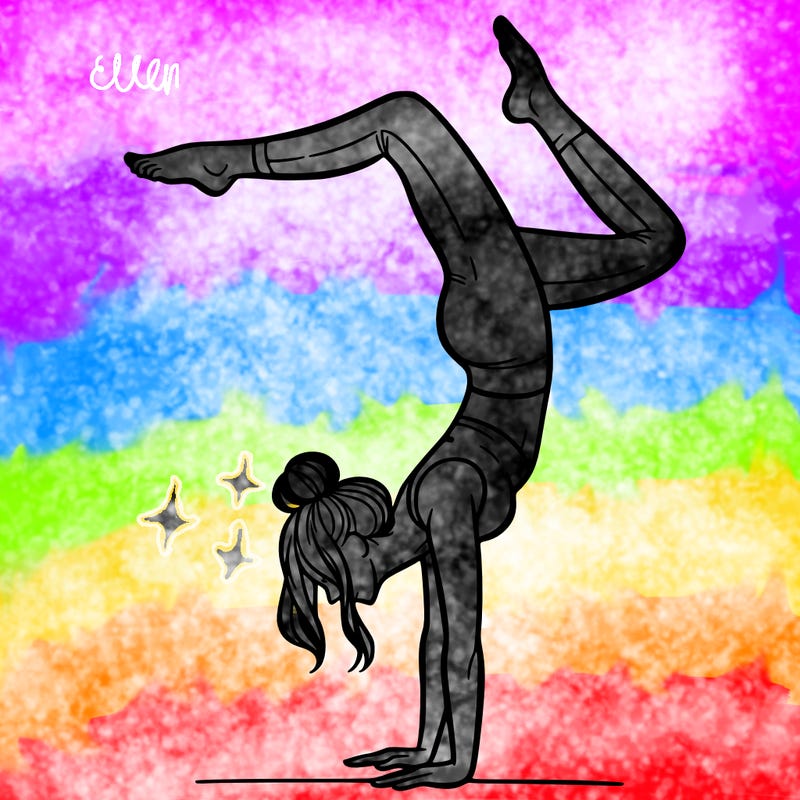 a woman doing a handstand