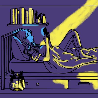 a girl laying on her bed with her phone