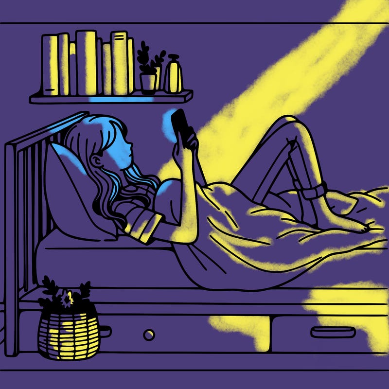 a girl laying on her bed with her phone