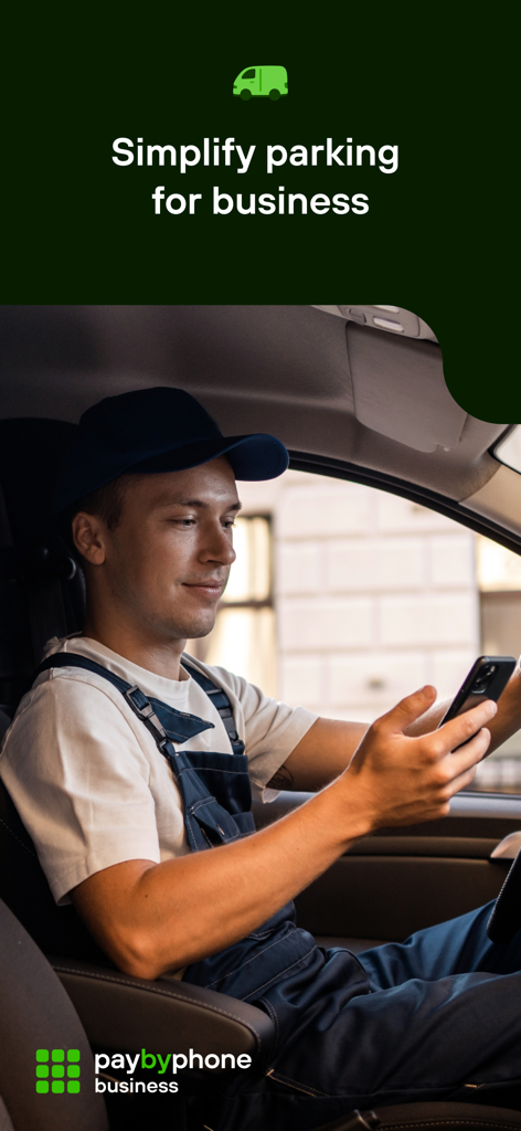 A professional driver in a work vehicle using his smartphone for business parking with the PayByPhone app.