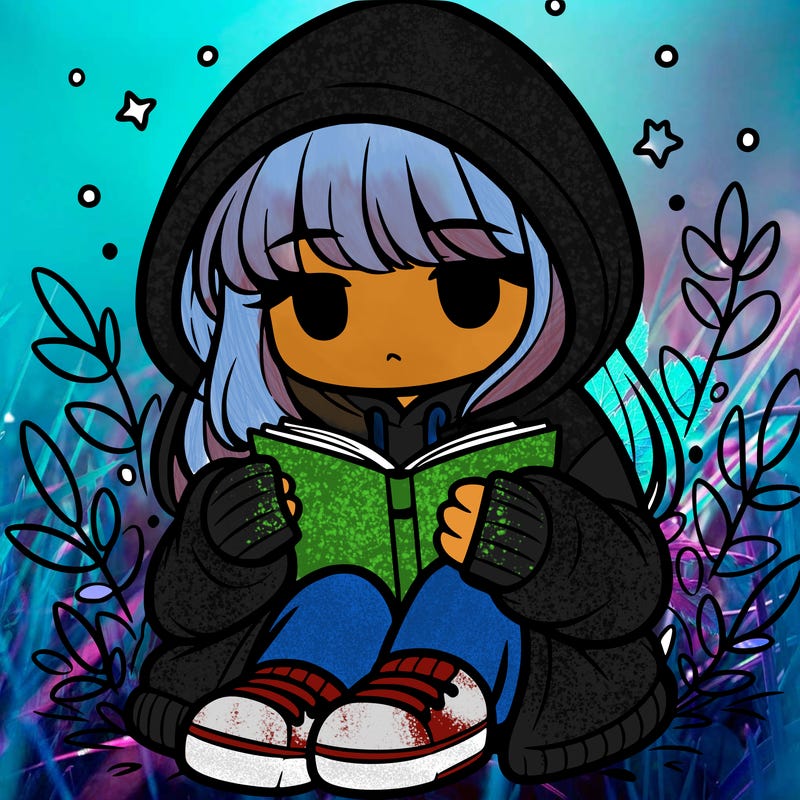 girl in oversized hoodie reading a book