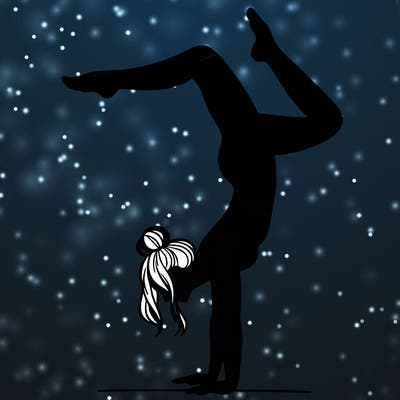 a woman doing a handstand