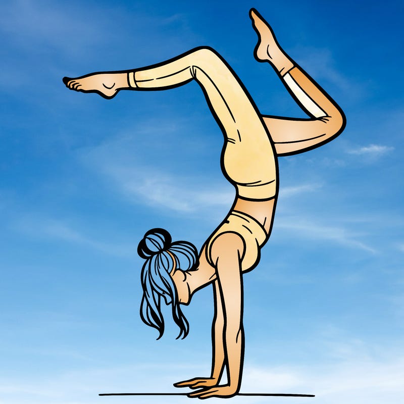 a woman doing a handstand
