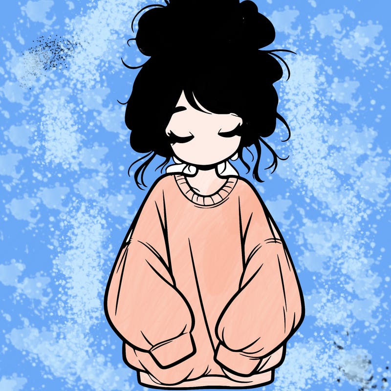 girl with baggy sweatshirt and messy bun