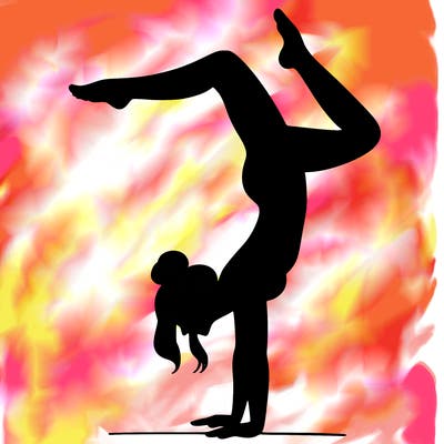 a woman doing a handstand