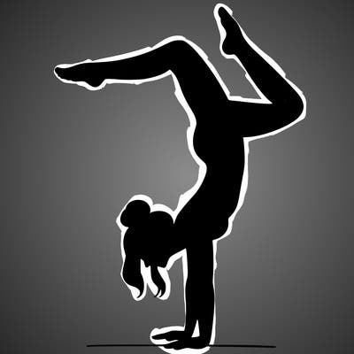 a woman doing a handstand