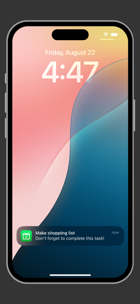 iPhone lock screen showing a task reminder notification from the Weekly Calendar Planner app