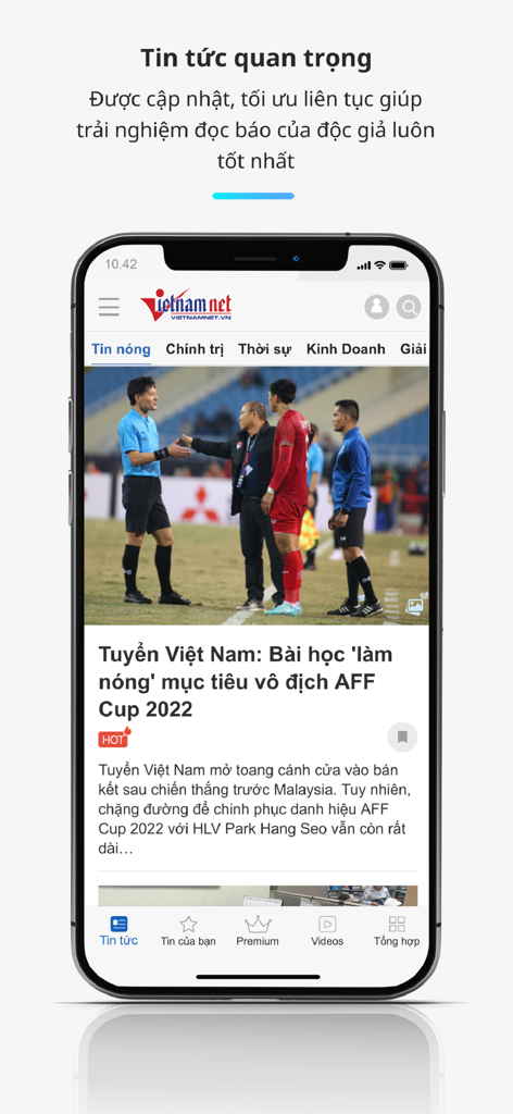Pantalla de un smartphone mostrando la aplicación VietNamNet con un artículo de noticias sobre el equipo de fútbol nacional de Vietnam