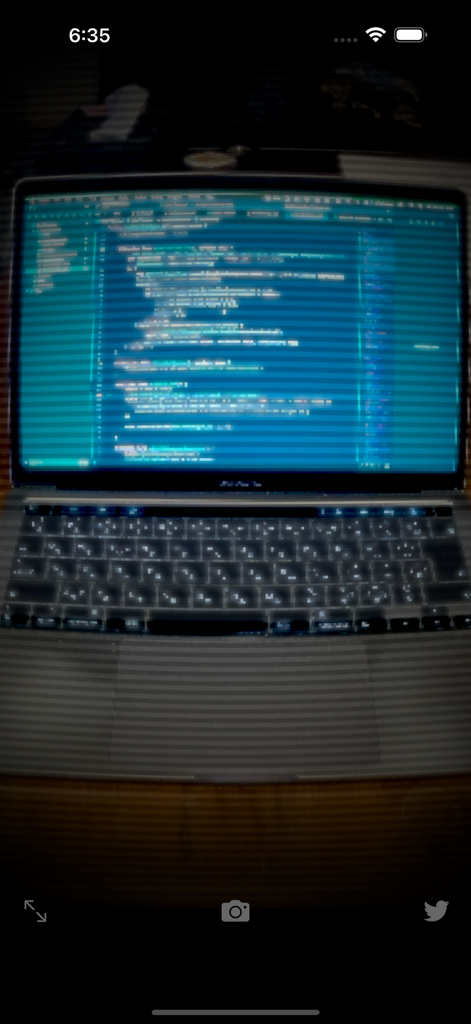 CRT Monitor FX :RetroTVCamera - Retro CRT monitor effect with scanlines applied to a laptop screen showing code