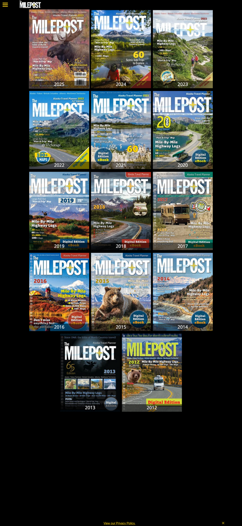 A collection of The MILEPOST annual travel guide covers from 2012 to 2025 featuring Alaska road trip and highway logs.
